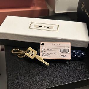 Miu Miu Gold Keychain with Navy Strap